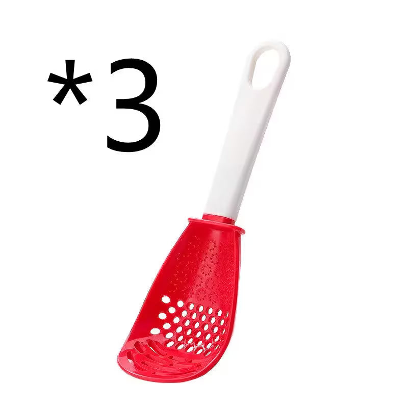 Red kitchen strainer with white handle on a white background, labeled with '*3'.