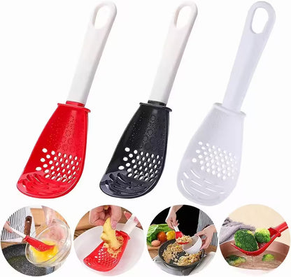 Three kitchen utensils with perforated designs on white background