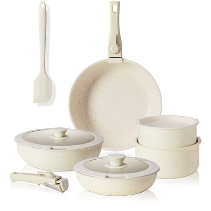 Set of ceramic cookware including pots, pans, and lids on a white background