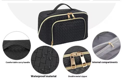 Black travel bag with features highlighted on a white background