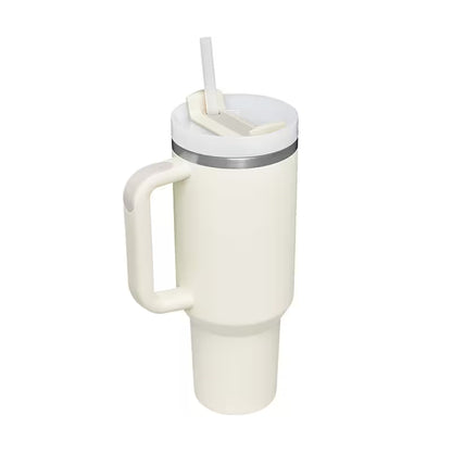 White insulated mug with handle and straw on a white background