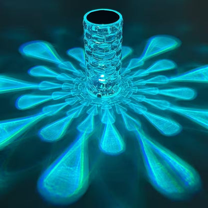 Crystal-like object with a central tube and radiating petals on a dark background