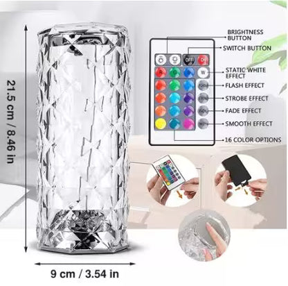 Crystal-like LED lamp with remote control and effect options on a light gray background