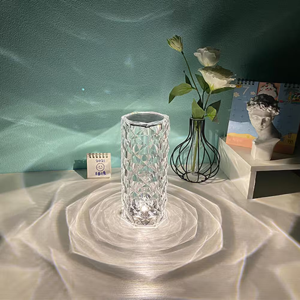 Crystal vase on a textured surface with a blurred background