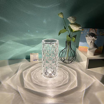 Crystal vase on a textured surface with a blurred background