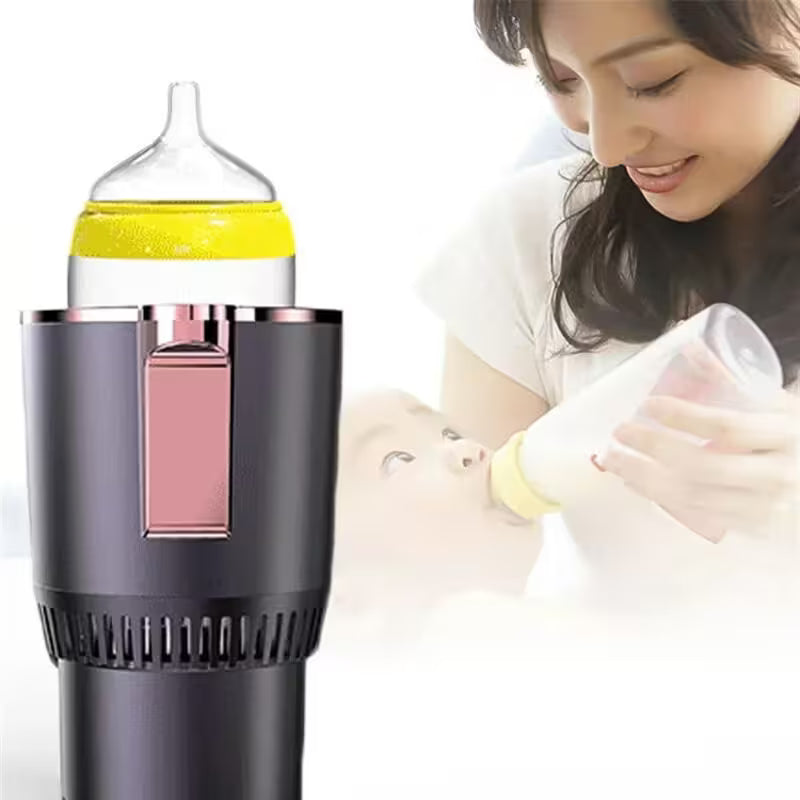 Woman feeding a baby with a bottle and a bottle warmer in the foreground.