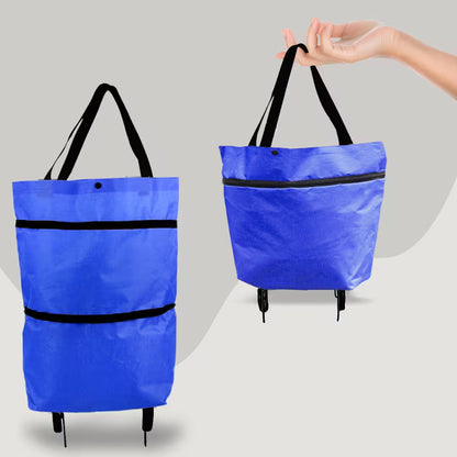 Blue shopping bag with black straps and wheels on a gray background
