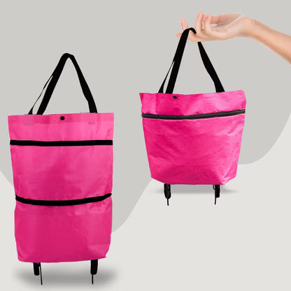 Pink shopping bag with wheels on a gray background