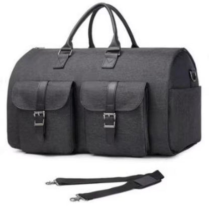 Gray duffel bag with multiple pockets and a strap on a white background