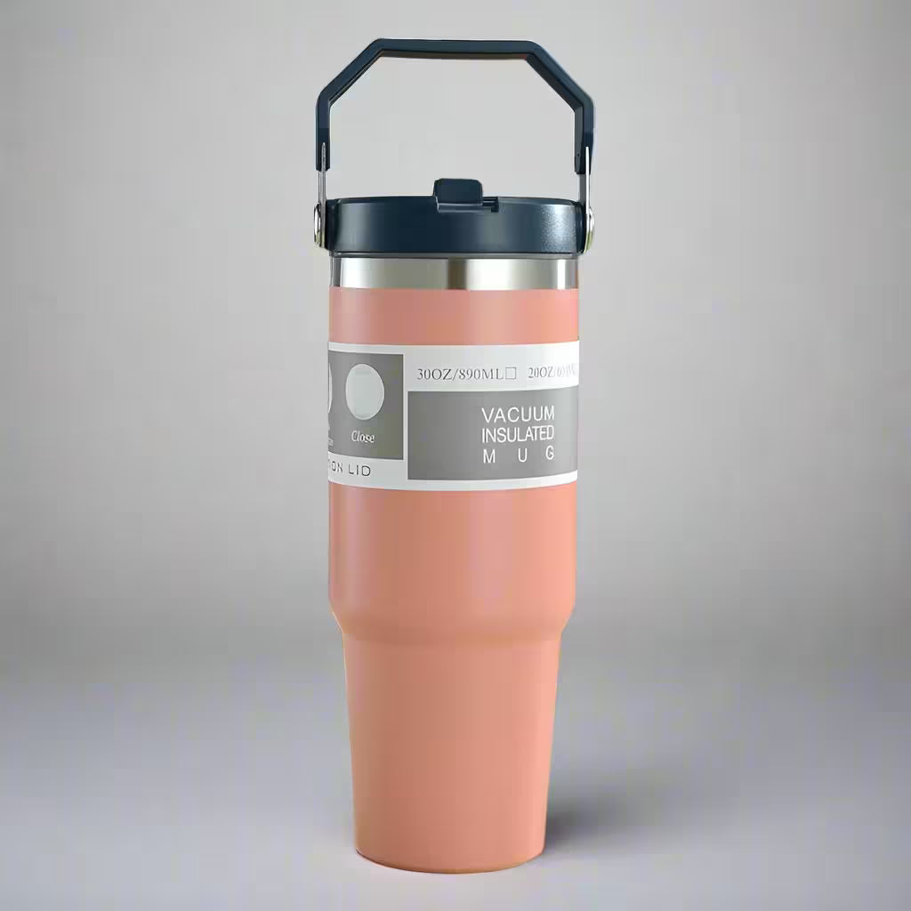 Vacuum insulated mug with a handle on a gray background