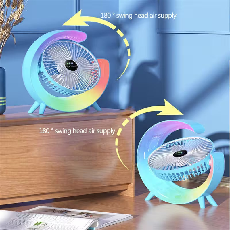 Colorful desk fan with 180-degree swing head air supply feature on a wooden surface.