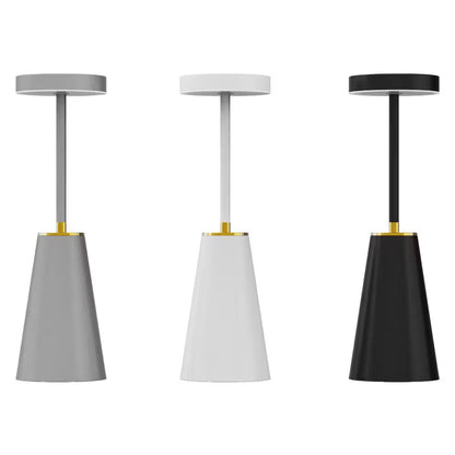 Three pendant lights in gray, white, and black with gold accents on a white background