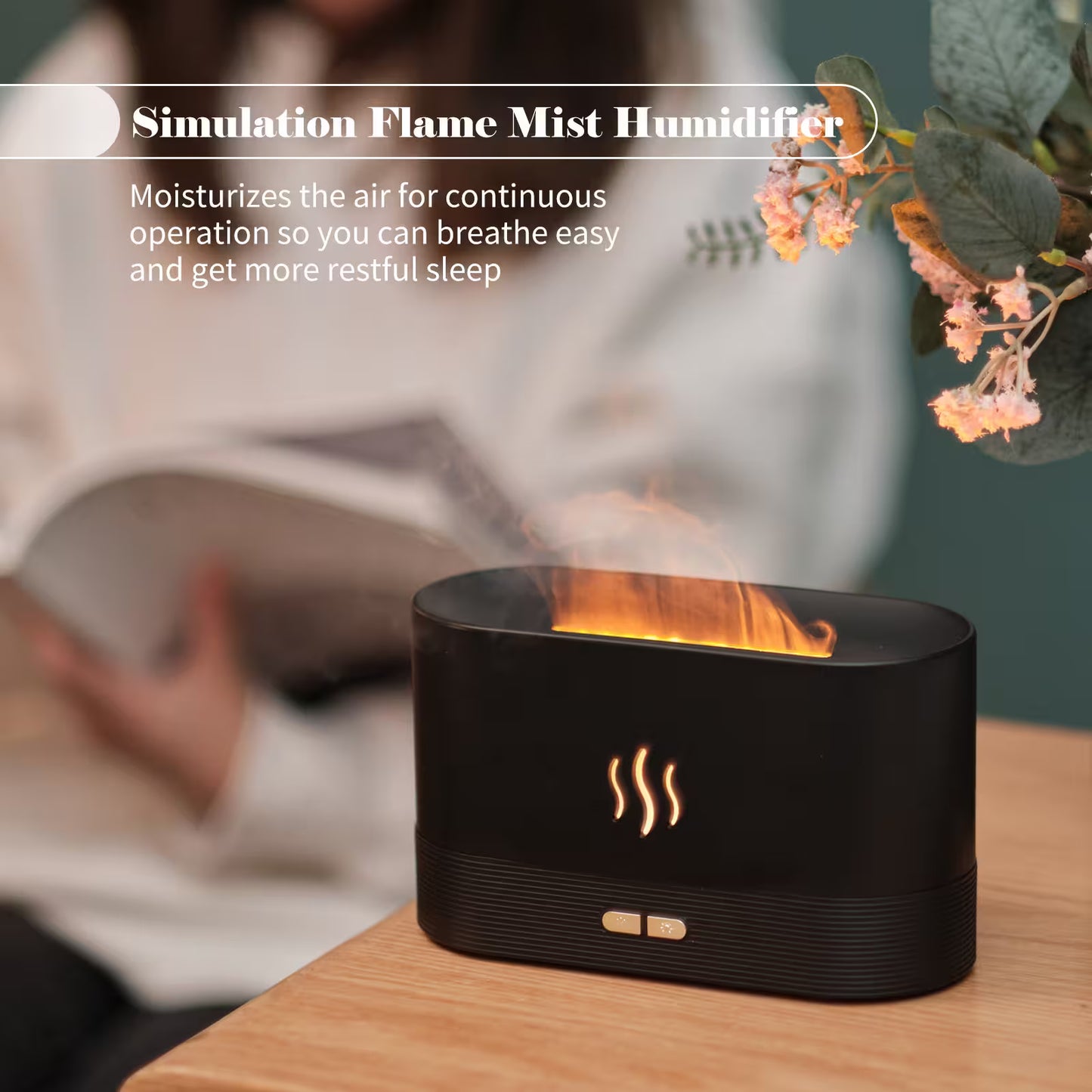 Simulation flame mist humidifier on a table with a blurred background of a person reading a book.