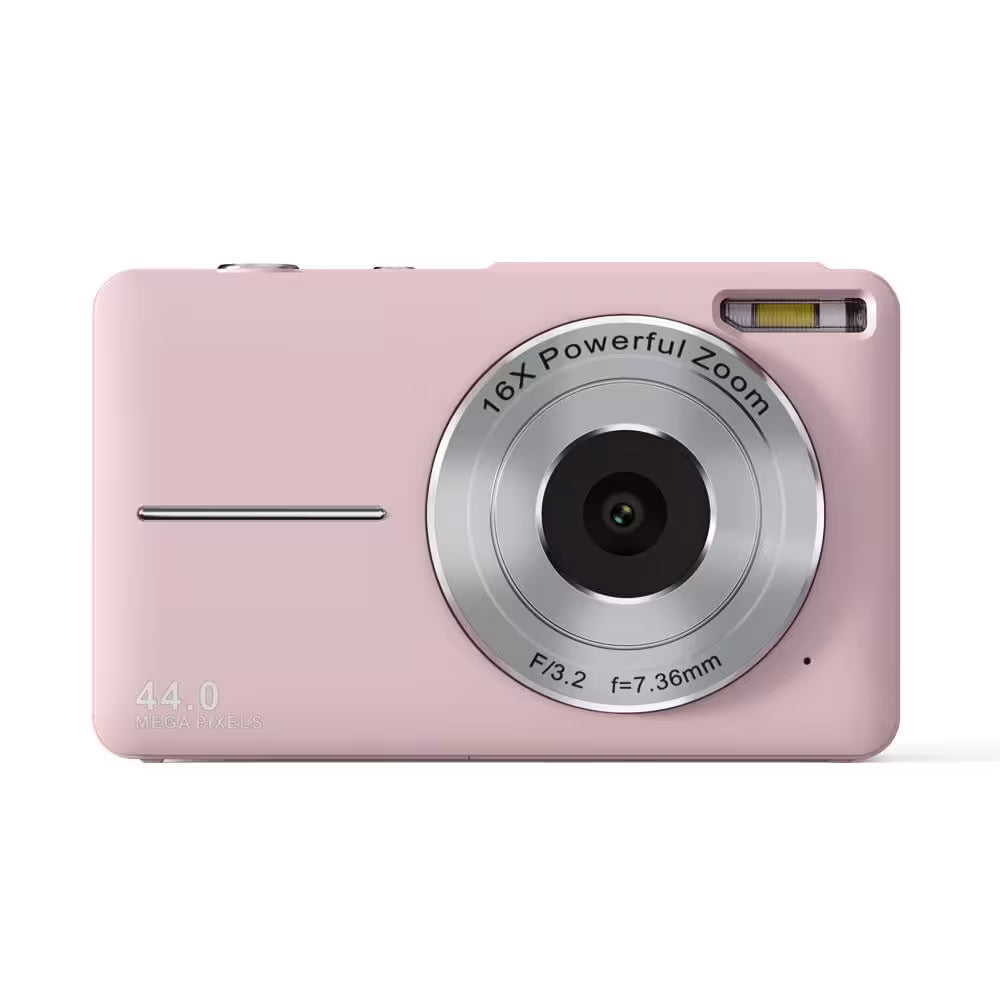 Pink digital camera with silver zoom lens on a white background