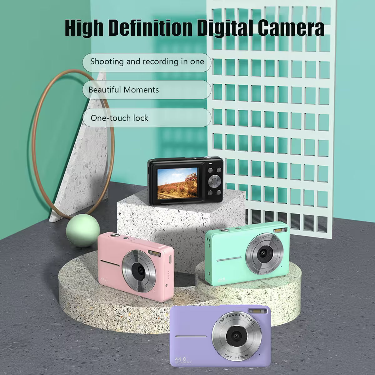 Three high-definition digital cameras in pink, green, and purple on a gray surface with a teal background.