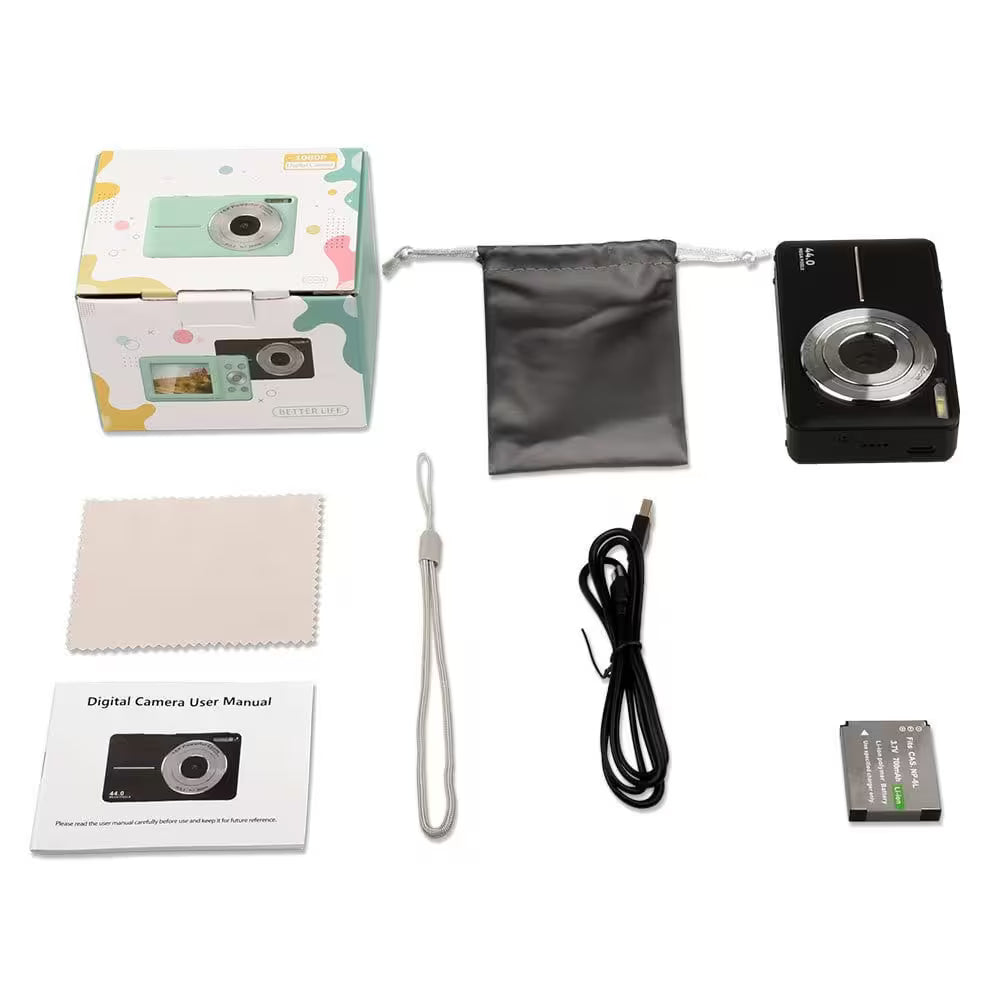 Digital camera set with packaging, camera, battery, cable, and user manual on a white background