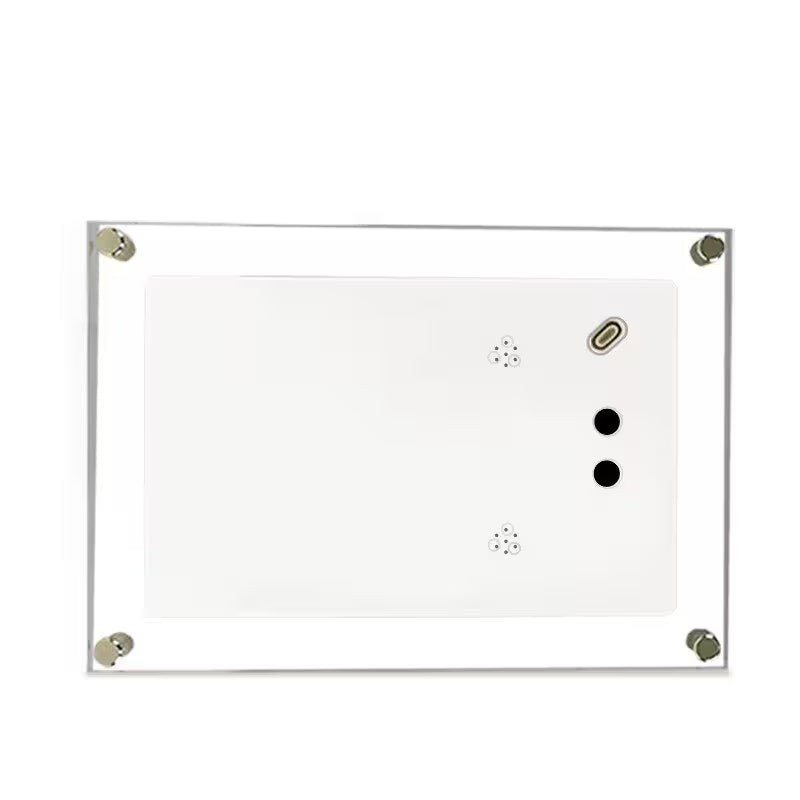 White dry erase board with silver frame and magnets on a white background