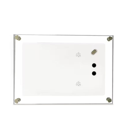 White dry erase board with silver frame and magnets on a white background