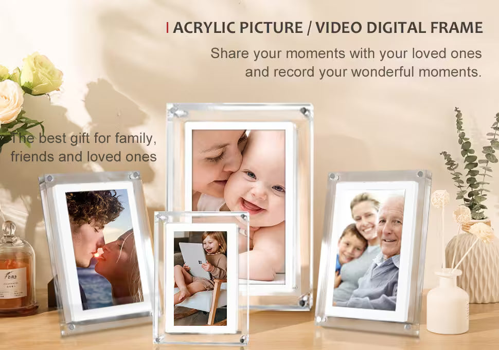 Acrylic picture/video digital frames on a wooden surface with decorative elements.