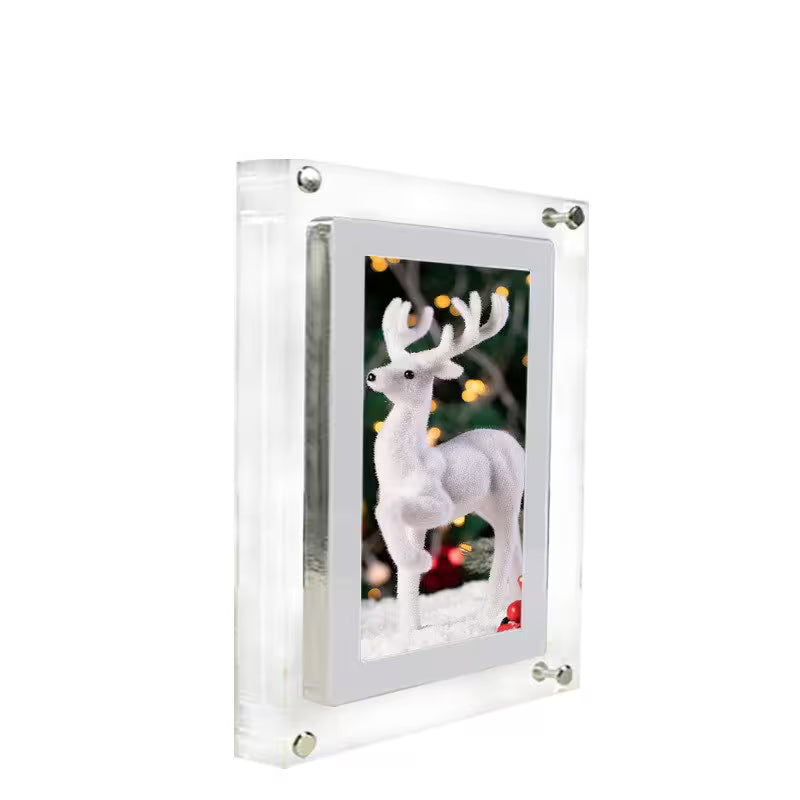 Clear acrylic photo frame with a white deer toy inside, on a white background