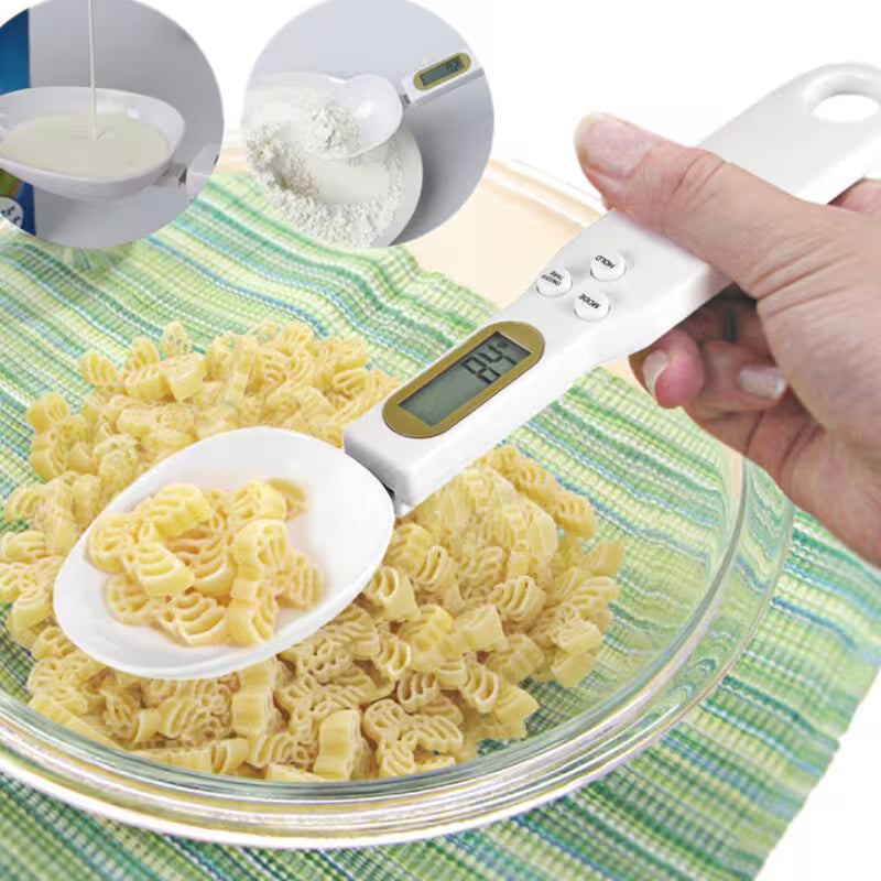 Digital measuring spoon with pasta in a bowl on a green and white checkered tablecloth
