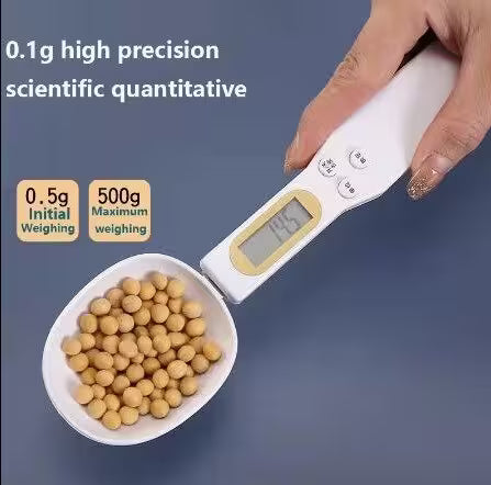 Digital measuring spoon with a bowl of beans on a blue background, displaying weight measurement.