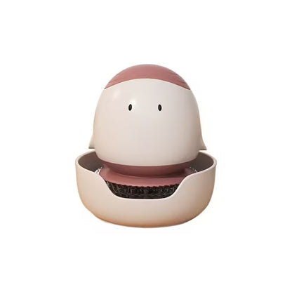 Small, round, beige and pink toy with a face on a white background