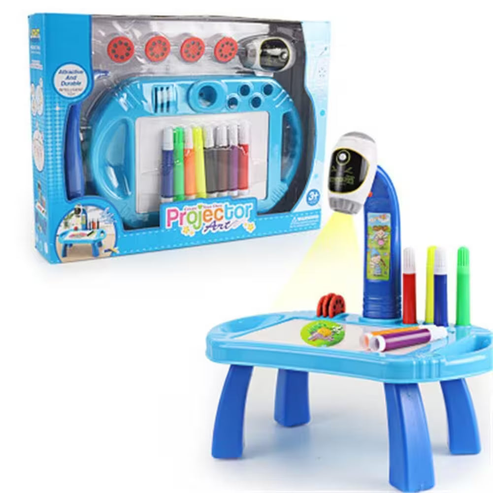 Toy art easel with projector and markers next to its packaging on a white background