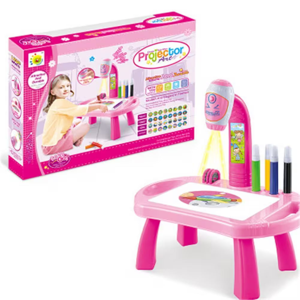 Pink toy projector table with accessories and packaging on a white background