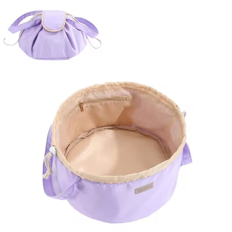 Purple and beige fabric storage bag with drawstring top on a white background