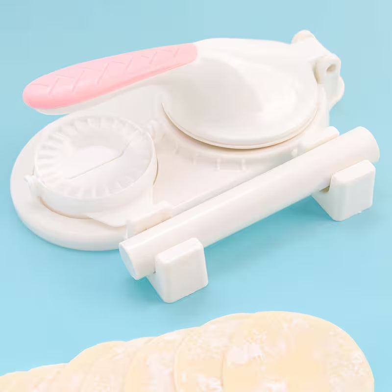 White and pink kitchen tool on a light blue background