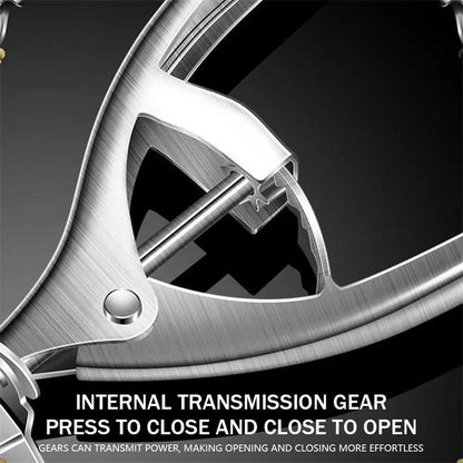 Close-up of a mechanical gear system with text on a dark background