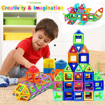 Child playing with colorful magnetic building blocks in a bright room.