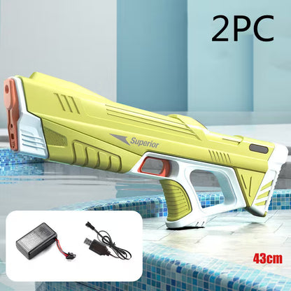 Yellow and white pool cleaning tool with battery and charger on a pool deck background
