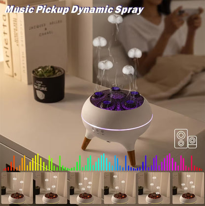 Music pickup dynamic spray device on a table with a blurred person using a phone in the background.