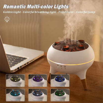 Tabletop humidifier with colorful light display next to a laptop on a wooden surface.