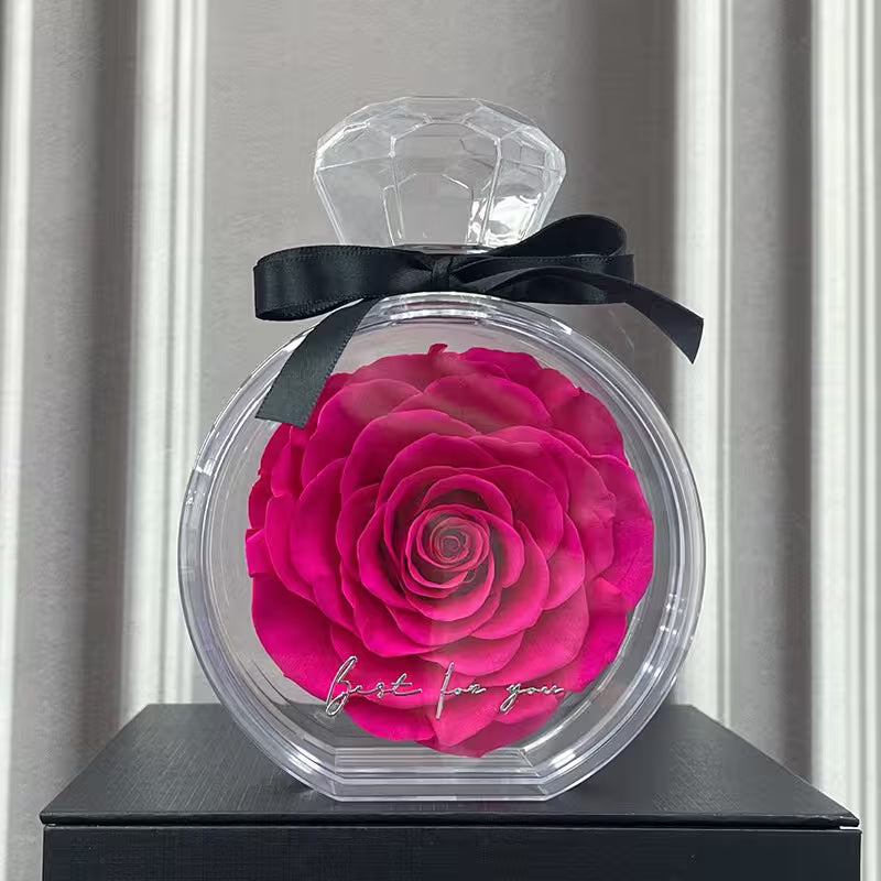 Decorative bottle with a pink rose and 'just for you' text on a neutral background