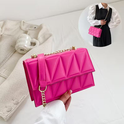 Pink quilted handbag held by a person on a white surface with a small inset of a person wearing the bag.