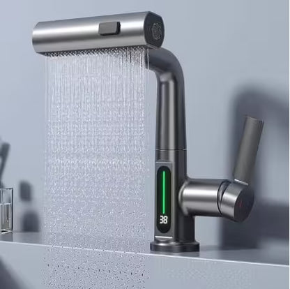 Modern kitchen faucet with showerhead and digital display on a gray background