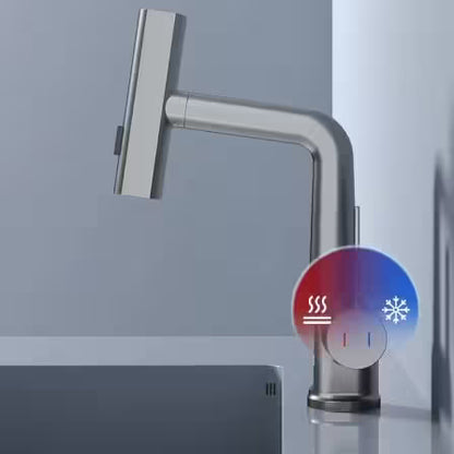 Modern kitchen faucet with temperature control indicators on a neutral background
