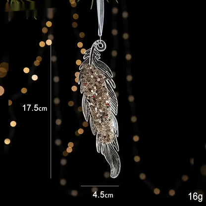 Decorative feather ornament with measurements against a blurred light background