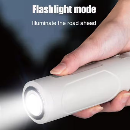 Hand holding a flashlight with text 'Flashlight mode Illuminate the road ahead' on a dark background