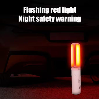 Flashing red light night safety warning device on a car's undercarriage.