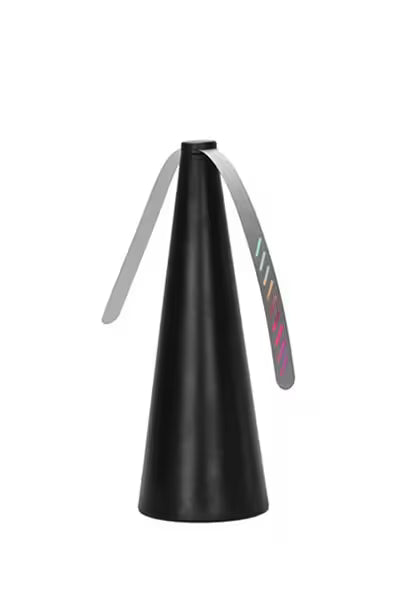 Black cone-shaped object with a metallic finish on a white background