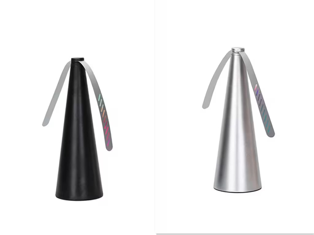 Black and silver kitchen sprayer on a white background