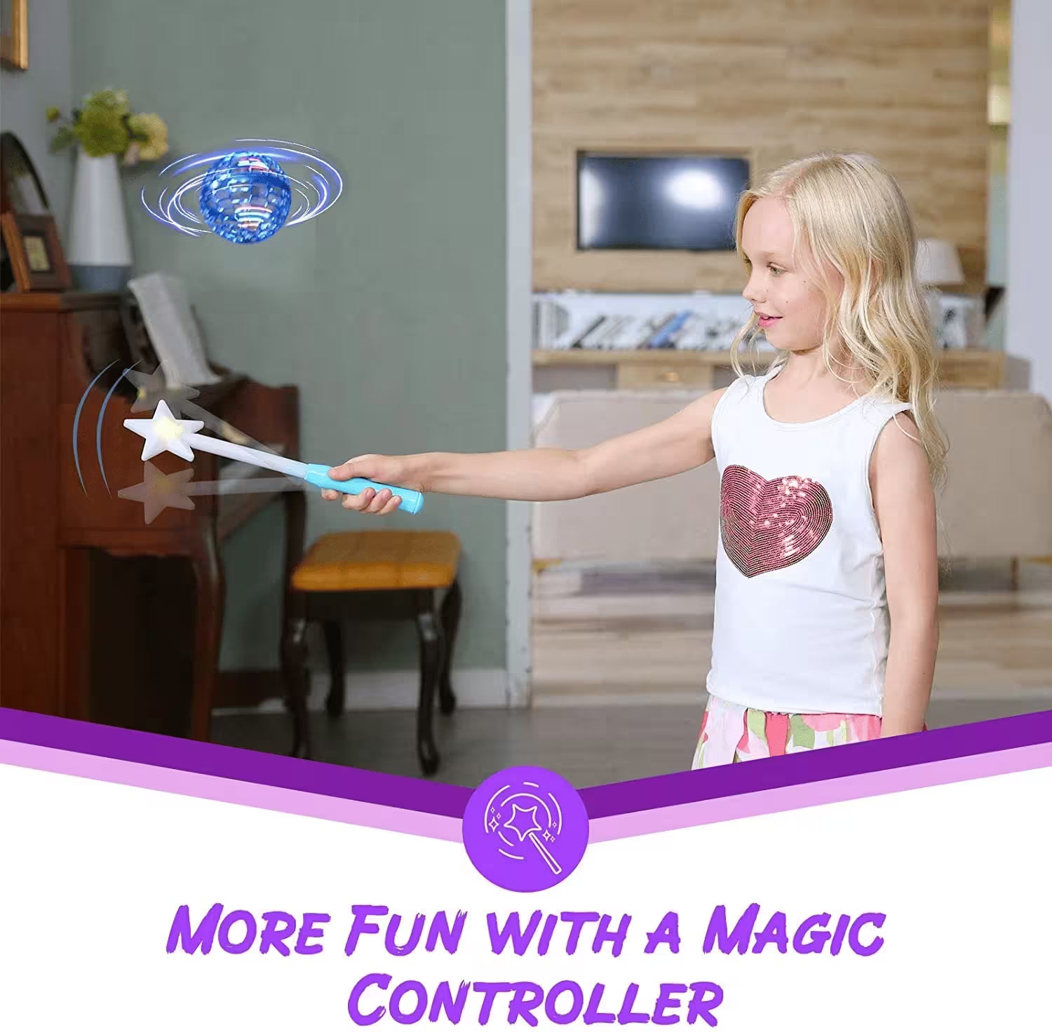 Young girl playing with a magic controller toy in a living room.