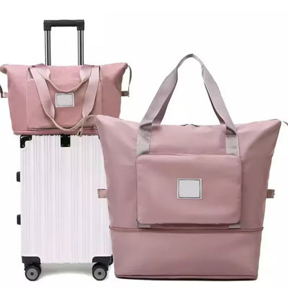 Pink travel bag with a suitcase on a white background