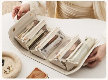 Beige toiletry bag with products on a white surface