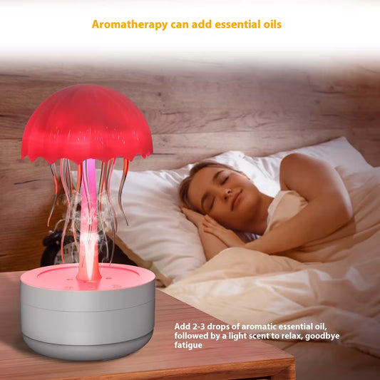 Jellyfish-shaped diffuser on a bedside table with a person sleeping in the background.