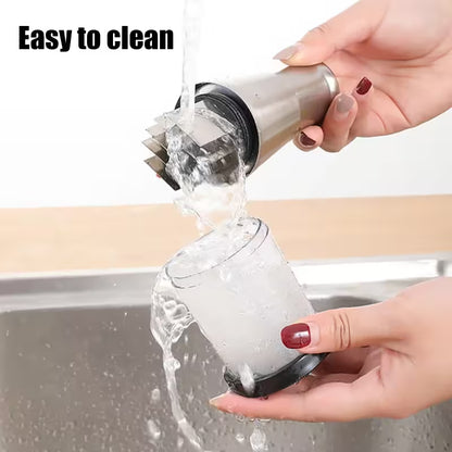 Person washing a glass with a cleaning brush under running water, with text 'Easy to clean' above.